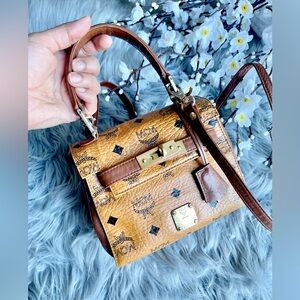 Authentic MCM congnac vintage mini crossbody bag ( NW430)